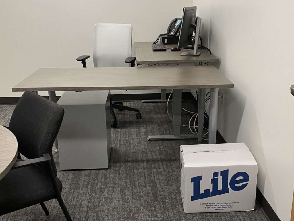 An office installation with Lile moving box in front of a desk